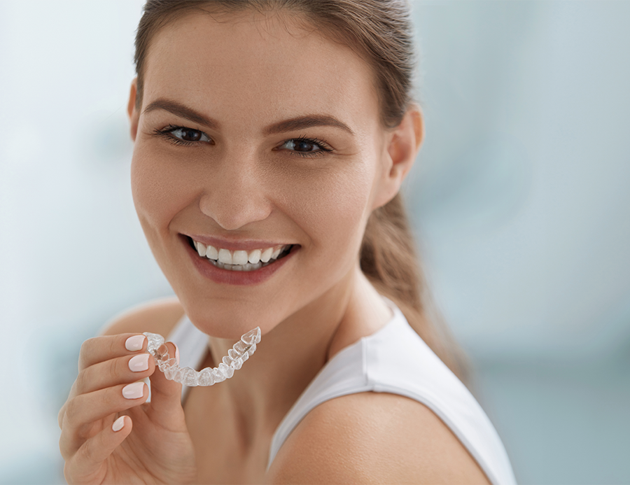 Women with Invisalign.